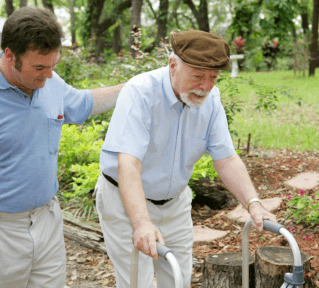 An old man and male caregiver
