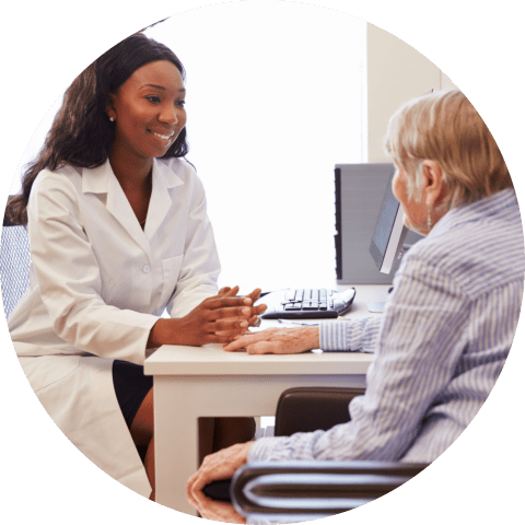 senior patient having consultation with doctor in office